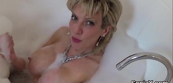  Unfaithful british milf lady sonia flashes her heavy jugs